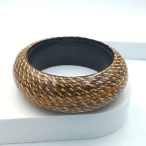 Vintage large bangle bracelet with ropes encased in plastic. nautical
